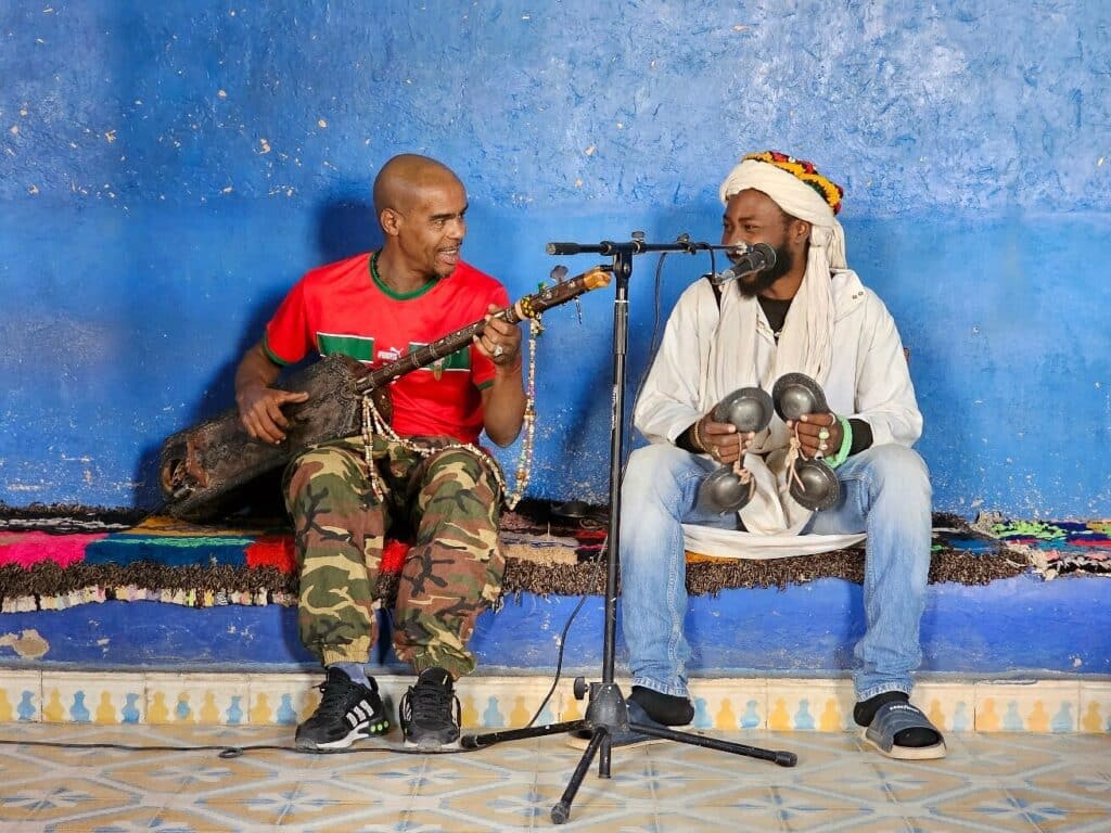 Gnawa musicians performing traditional music in Khamlia village near Merzouga, Morocco
